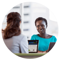 Female business woman, inquiring with an Insight expert about optimizing supply chain