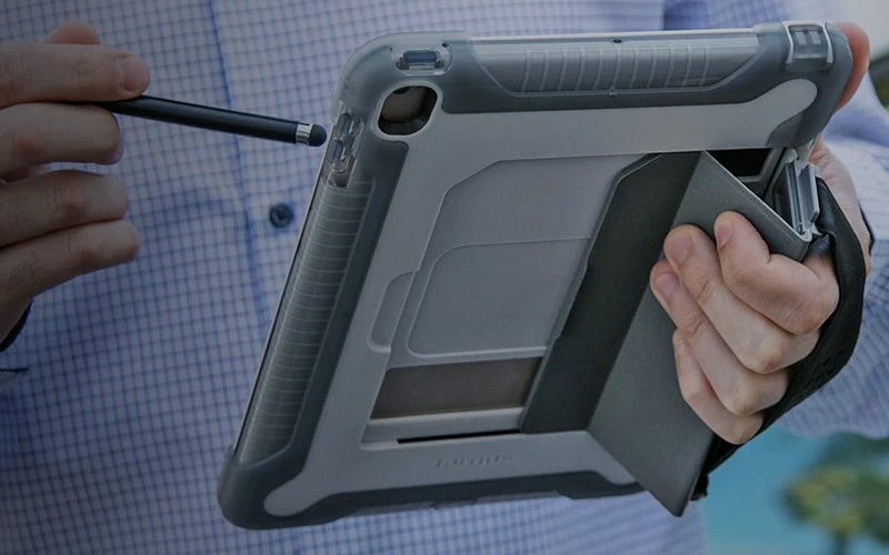 Man holding a tablet in a Targus Rugged case.