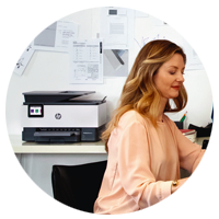 Woman working near a printer