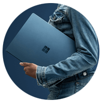Surface laptop goes everywhere, Woman holding a steel blue laptop