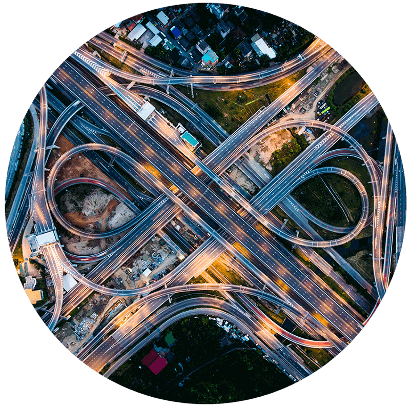 Highway networking concept, aerial view at dusk