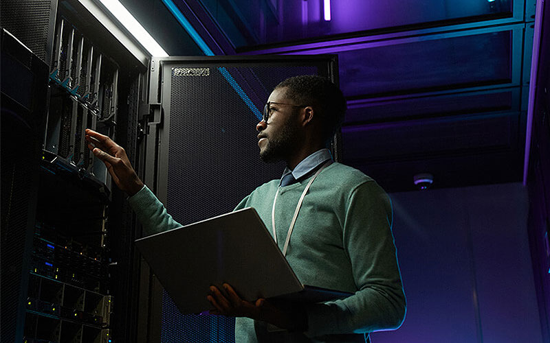 IT engineer around data center servers