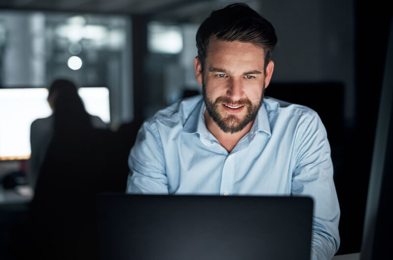 Man using tablet device in office