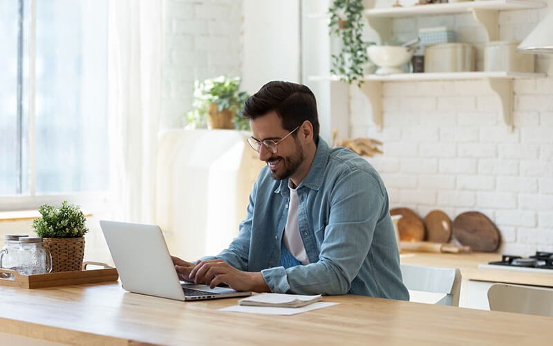 User working on laptop