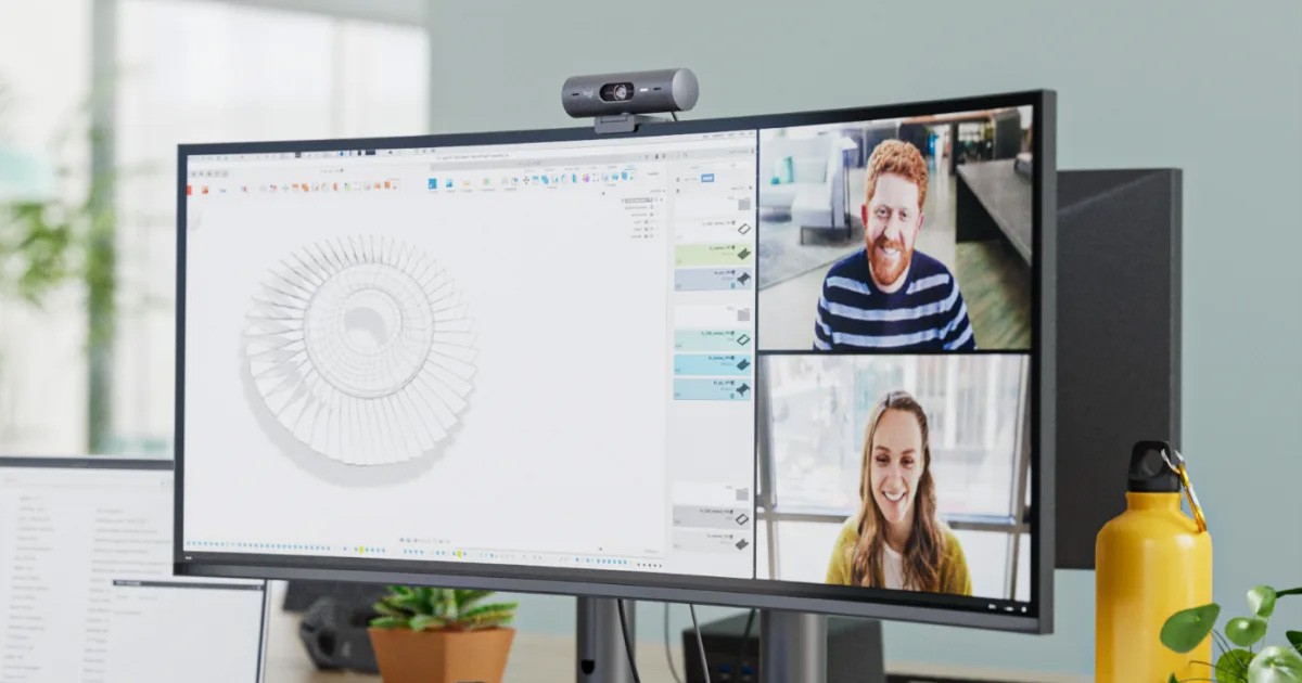 Logitech Bio webcam on monitor with video conference on screen