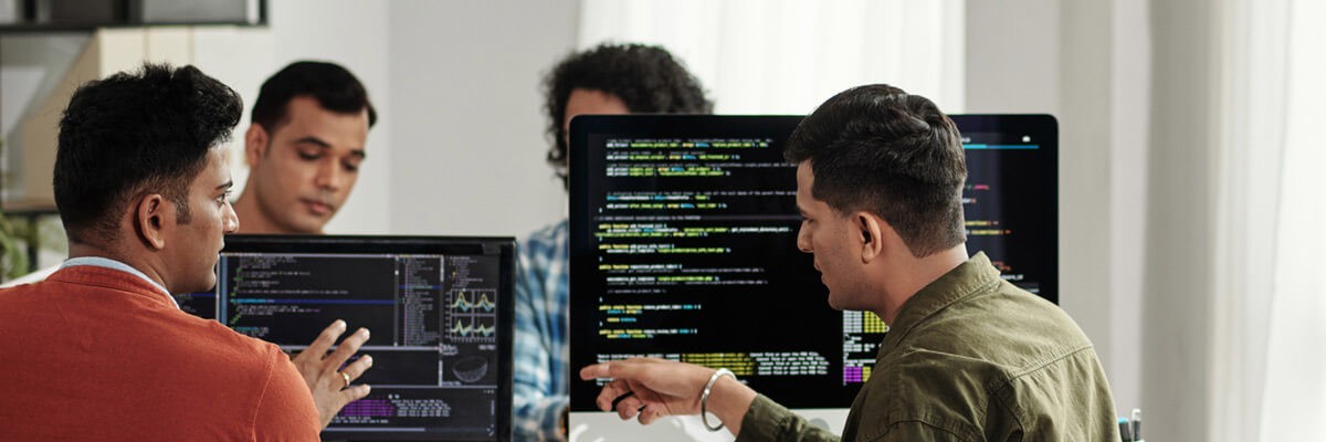 Software developers discuss how to create innovative software