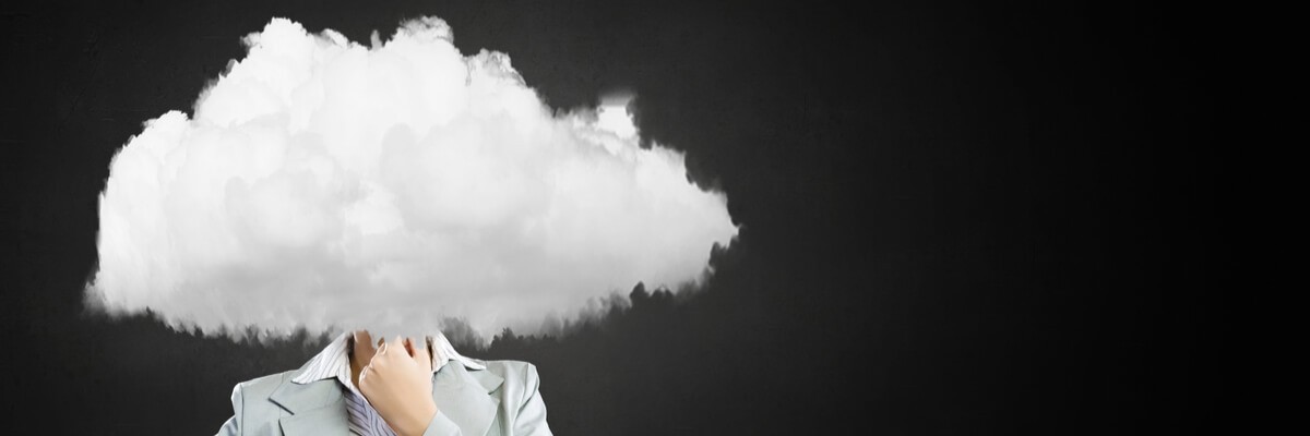 Rendering of businesswoman deep in thought with cloud over her head