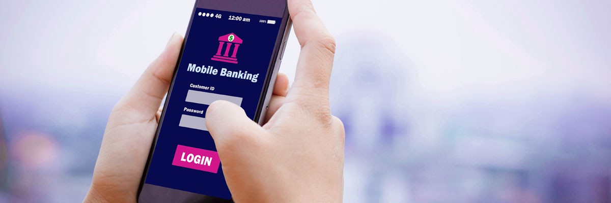 Close up of hands using a mobile banking app 