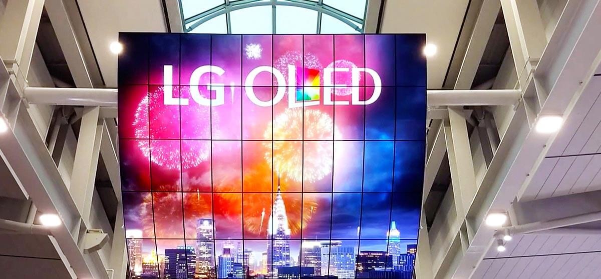 Advertisement for LG OLED displays on a screen