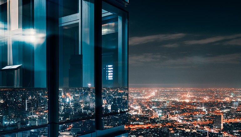 Modern business window overlooking city skyline. SD-WAN, Network infrastructure