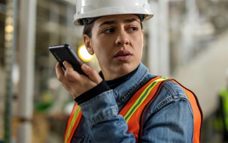 Worker using Samsung device