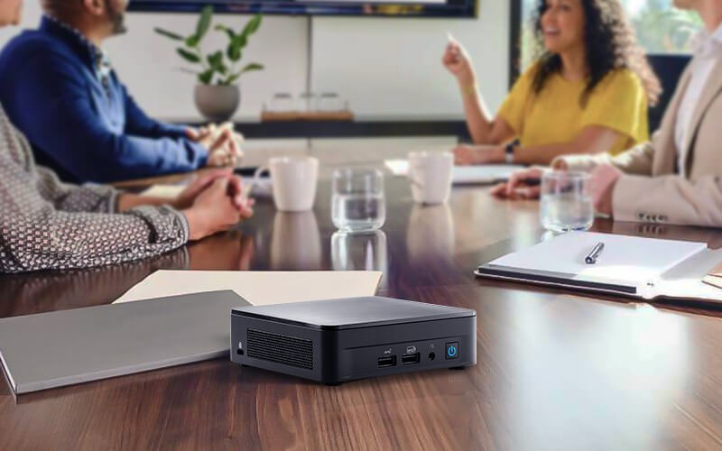 People having a meeting with NUC device